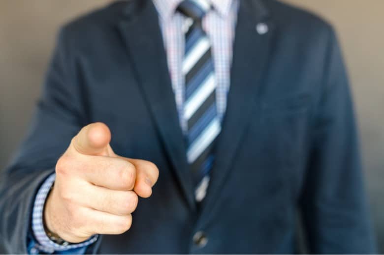 man pointing his finger at other driver